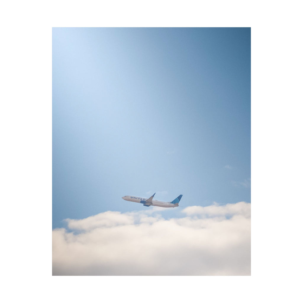 Airplane in Blue Sky Matte Poster — Vertical Travel Wall Art