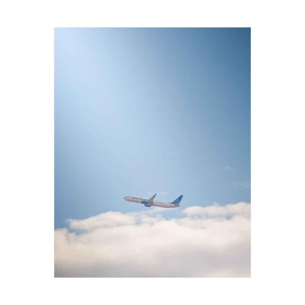 Airplane in Blue Sky Matte Poster — Vertical Travel Wall Art